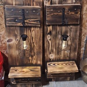 Homemade, Rustic Wooden Wall Sconces with Black Metal Cage Solar Lights